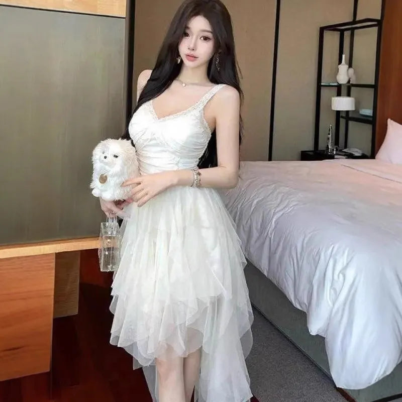 Elegant High-society Gown With An Offbeat Mesh Slip Dress Design