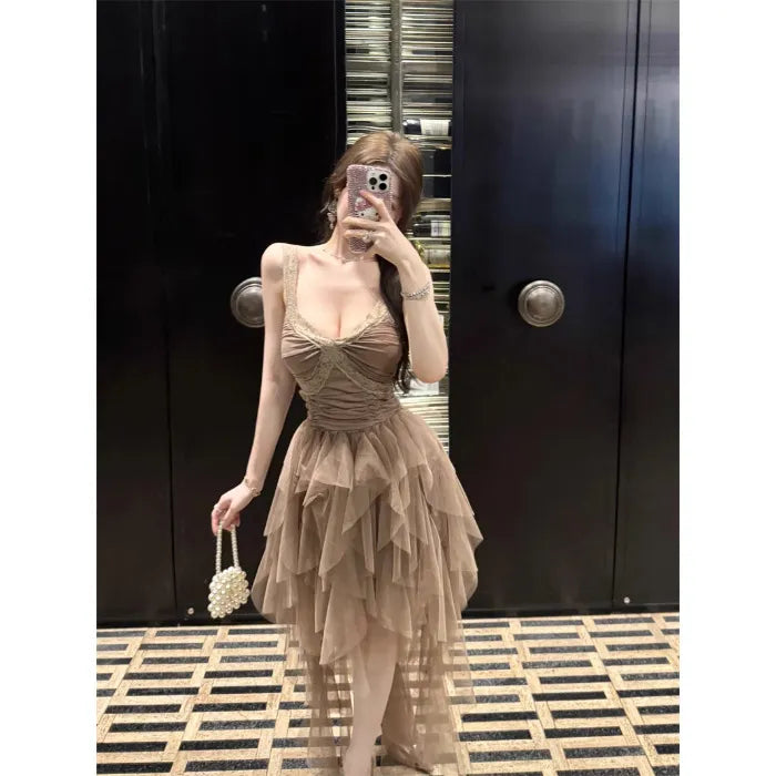 Elegant High-society Gown With An Offbeat Mesh Slip Dress Design